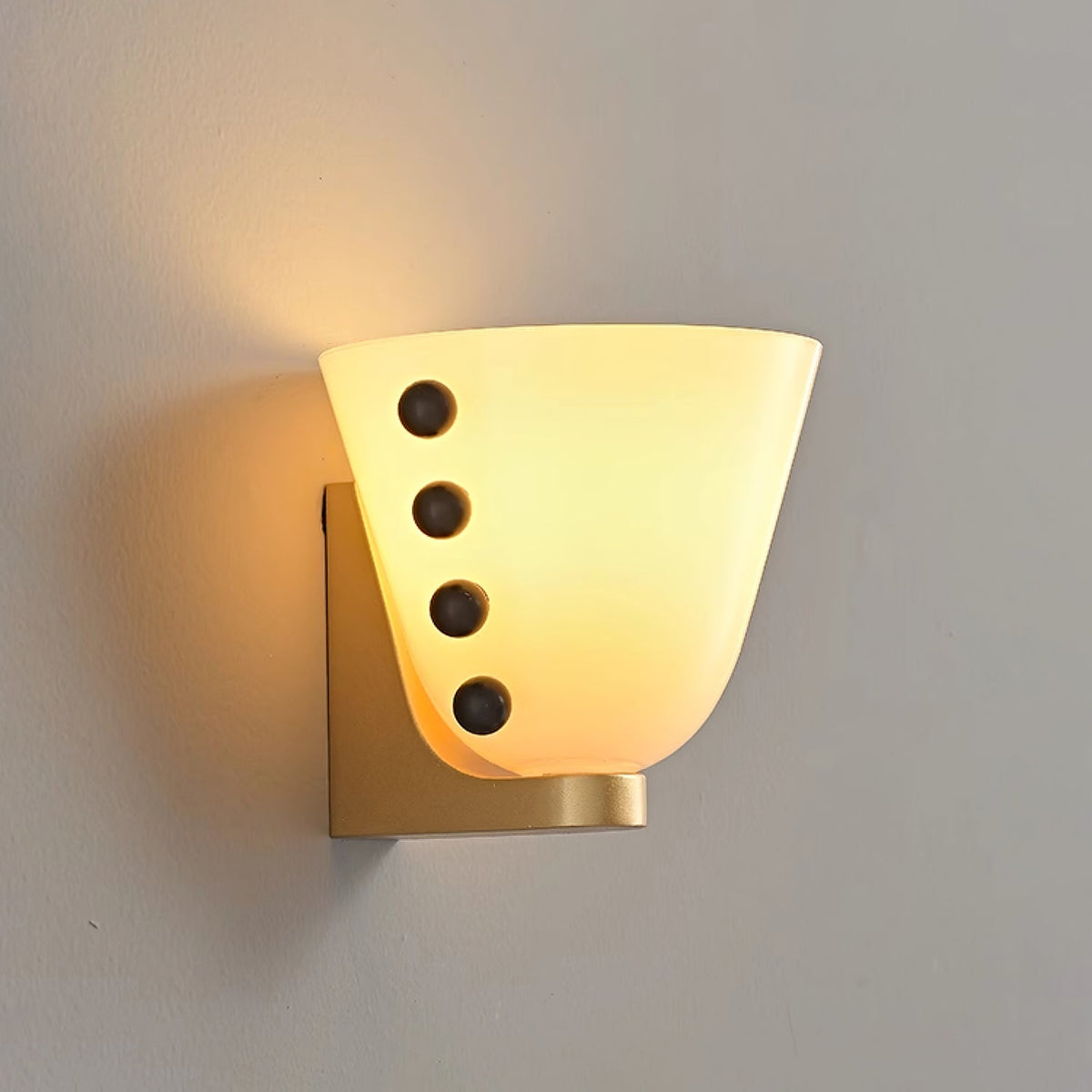 Velora Sculptural Wall Sconce in Matte Gold with Glass Shade
