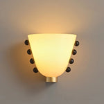 Velora Sculptural Wall Sconce in Matte Gold with Glass Shade