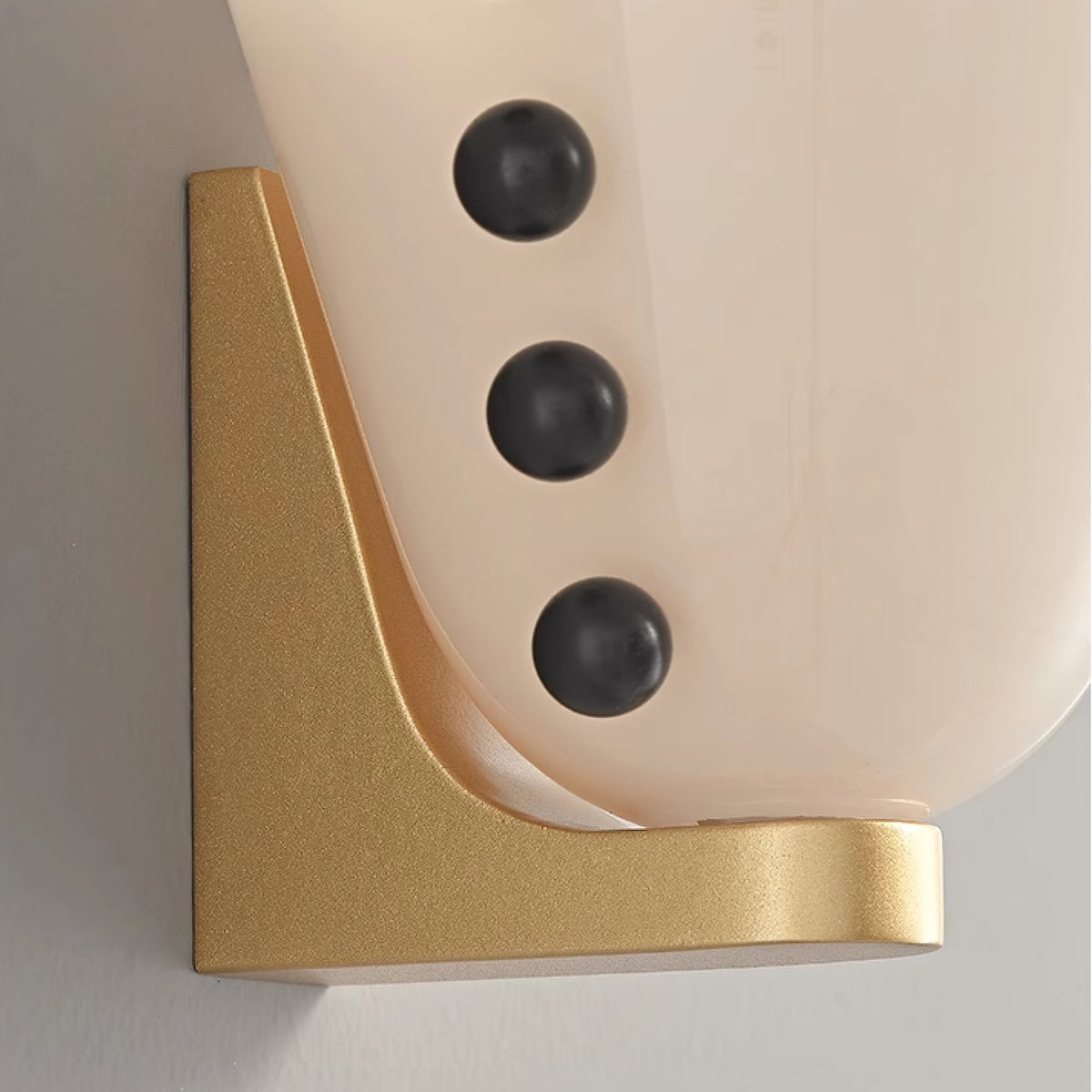 Velora Sculptural Wall Sconce in Matte Gold with Glass Shade