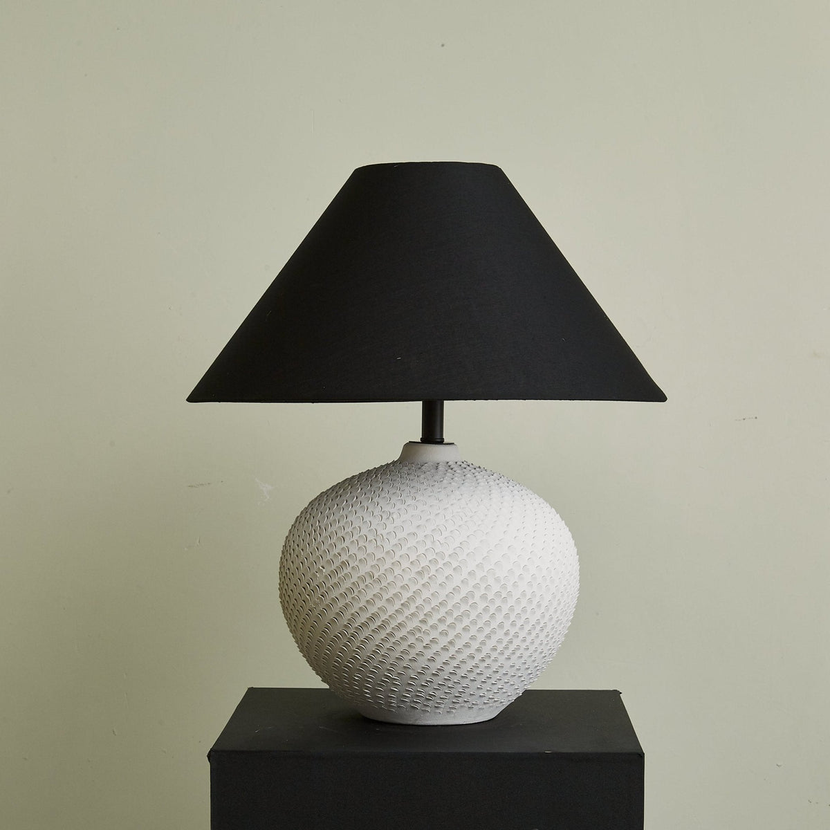 Velvra Sculpted Ceramic Table Lamp with Black Conical Shade