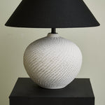 Velvra Sculpted Ceramic Table Lamp with Black Conical Shade