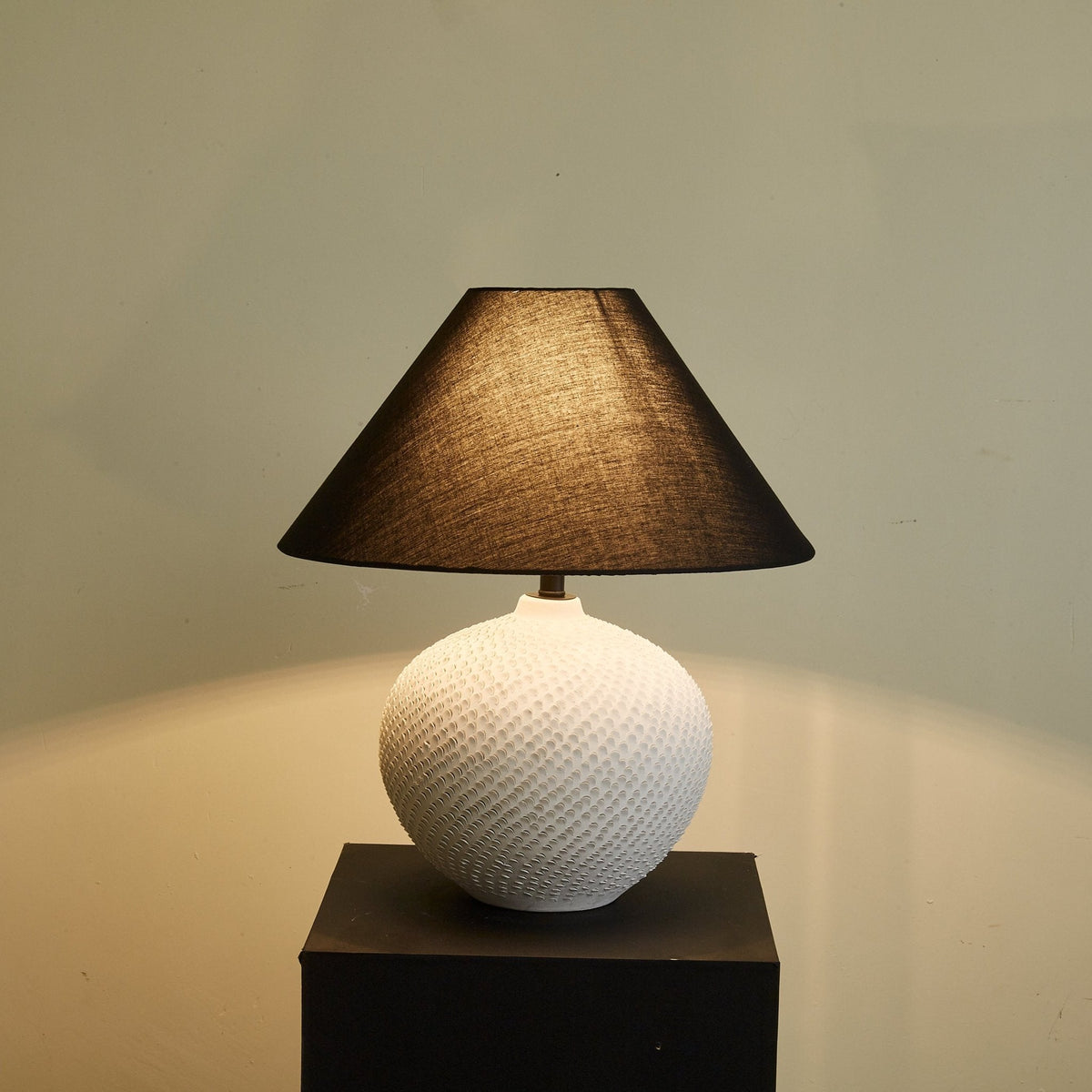 Velvra Sculpted Ceramic Table Lamp with Black Conical Shade