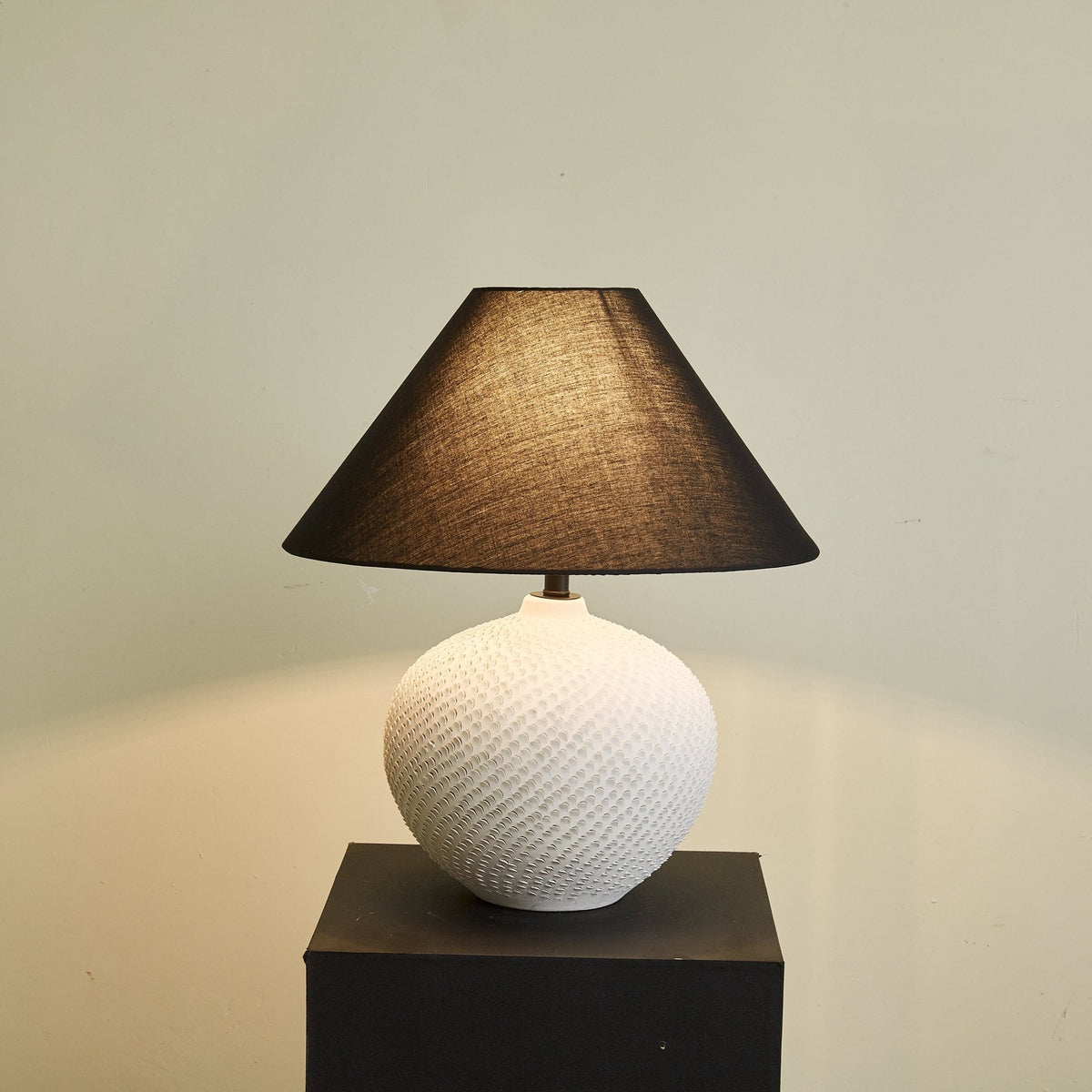Velvra Sculpted Ceramic Table Lamp with Black Conical Shade