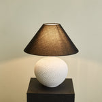 Velvra Sculpted Ceramic Table Lamp with Black Conical Shade