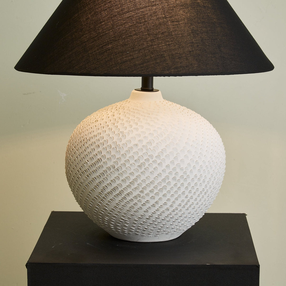 Velvra Sculpted Ceramic Table Lamp with Black Conical Shade