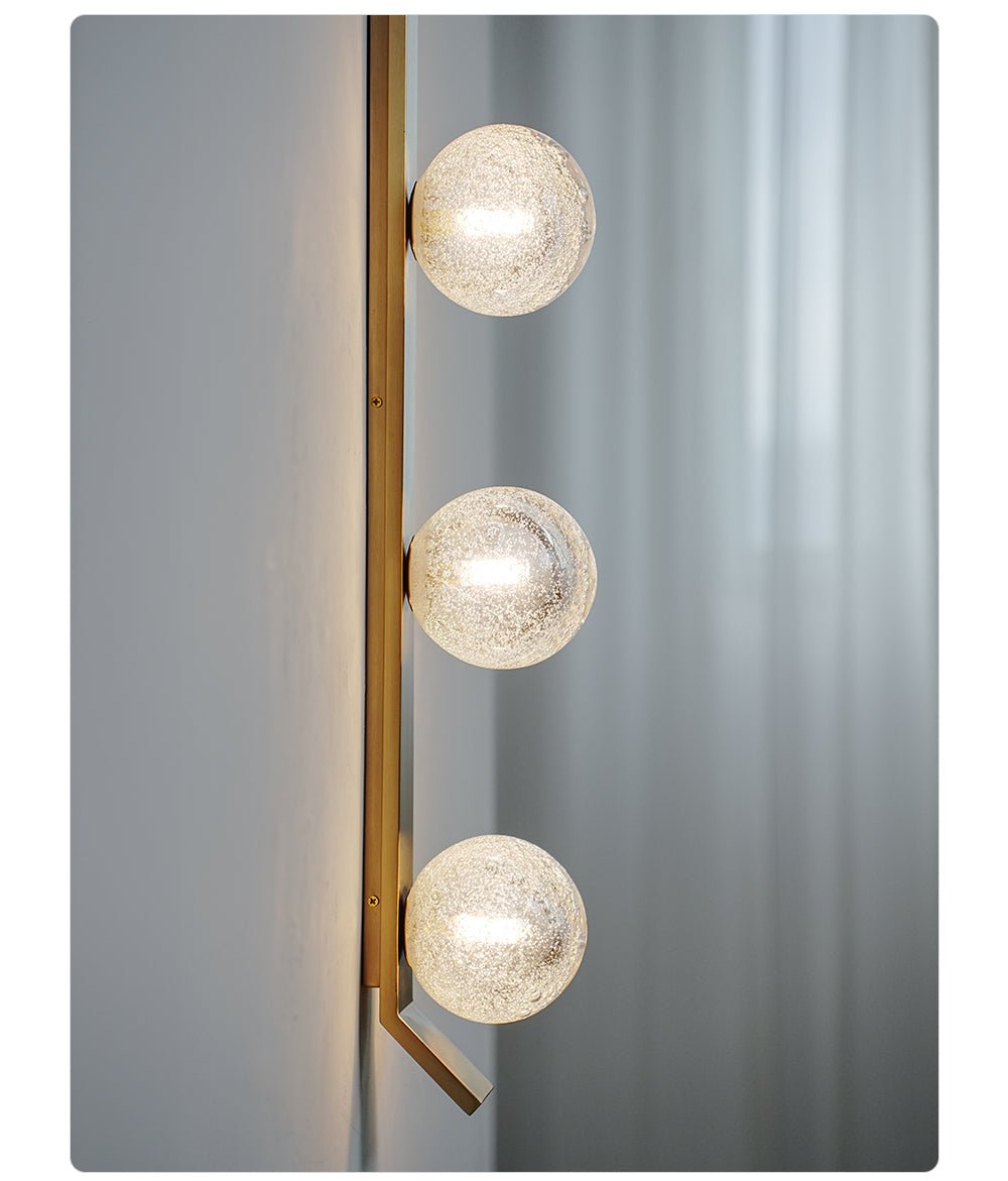 Vertical Balls Bar Wall Sconce in Gold with Clear Glass Globes