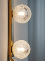 Vertical Balls Bar Wall Sconce in Gold with Clear Glass Globes