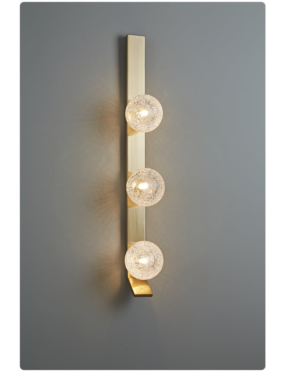 Vertical Balls Bar Wall Sconce in Gold with Clear Glass Globes