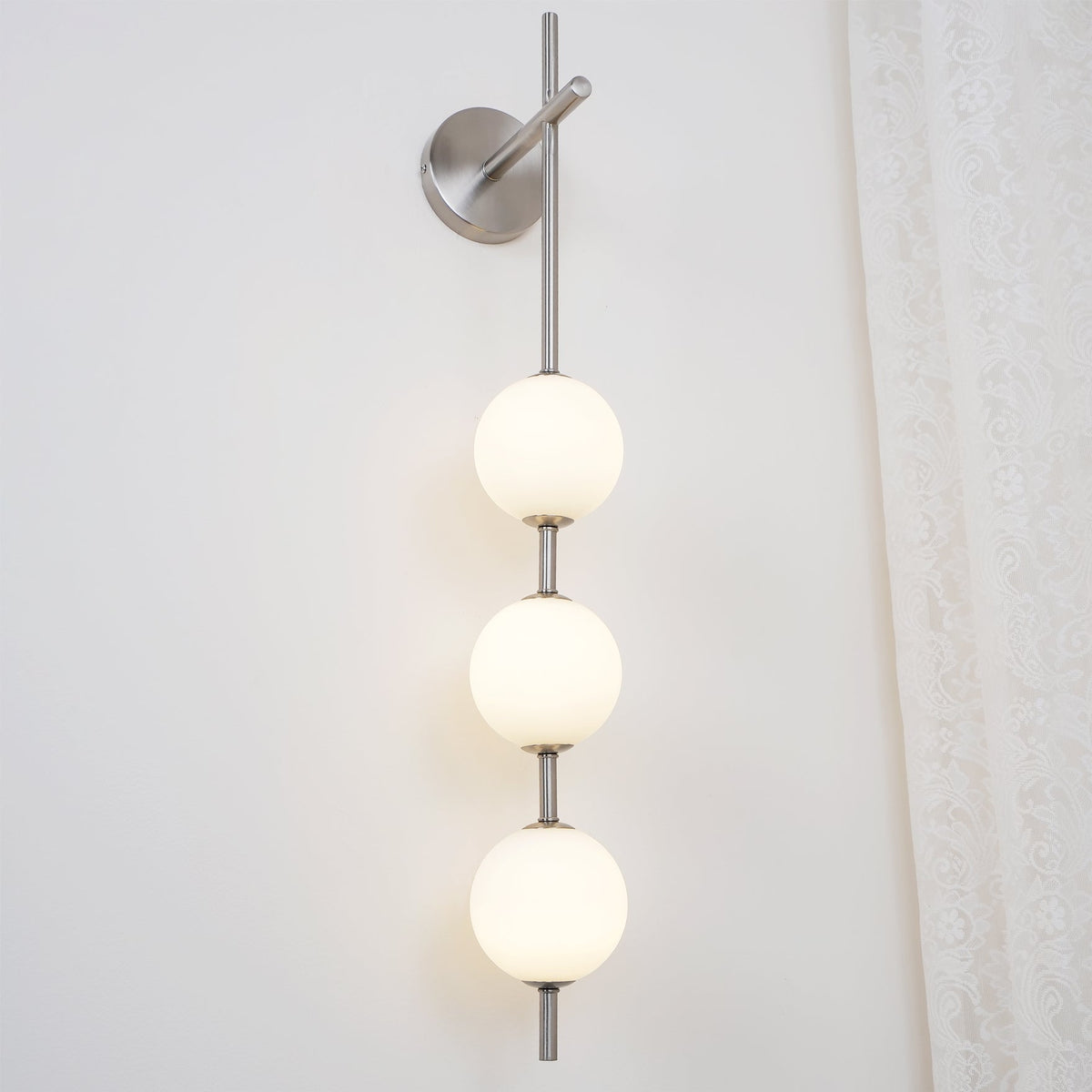 Vertical Globe Plug In Wall Lamp