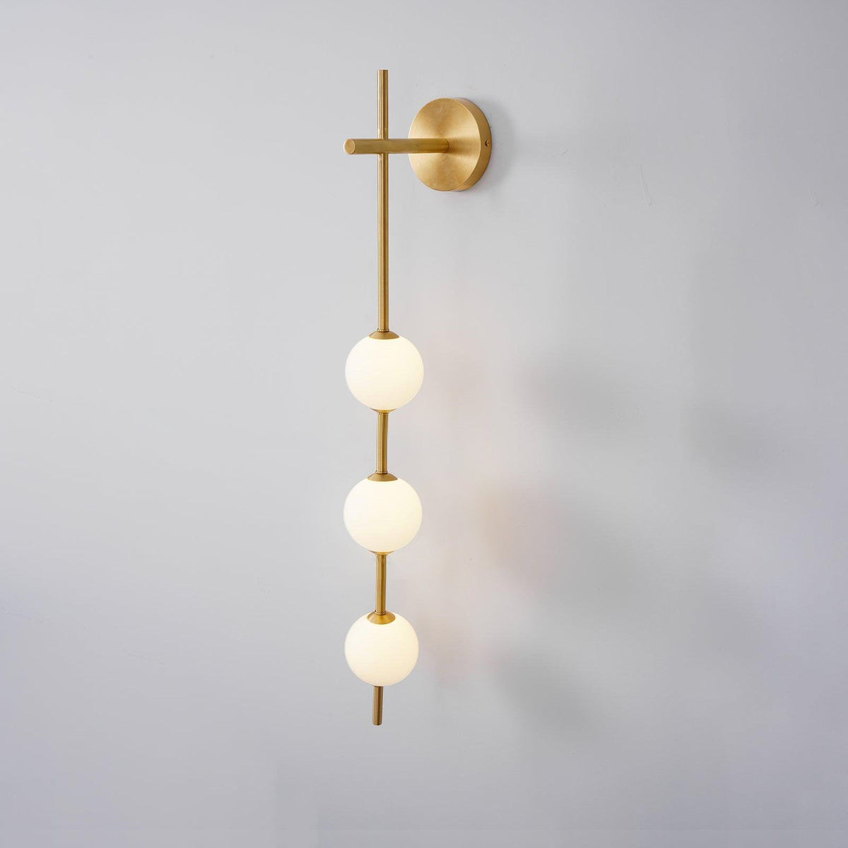 Vertical Globe Plug In Wall Lamp
