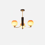 Caramel Globe Chandelier – Six-Light Brass & Glass Pendant for Dining and Living Spaces