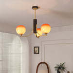Caramel Globe Chandelier – Six-Light Brass & Glass Pendant for Dining and Living Spaces