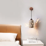 Volcanic Glow Travertine Wall Sconce with Walnut Accent