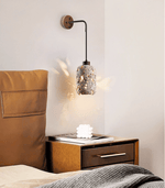 Volcanic Glow Travertine Wall Sconce with Walnut Accent