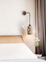 Volcanic Glow Travertine Wall Sconce with Walnut Accent