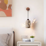 Volcanic Glow Travertine Wall Sconce with Walnut Accent