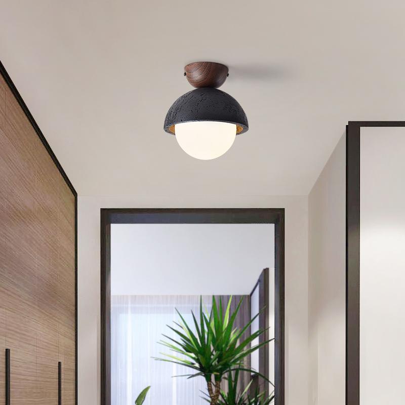 Volcanic Orb Flush Mount Ceiling Light in Black Travertine and Opal Glass
