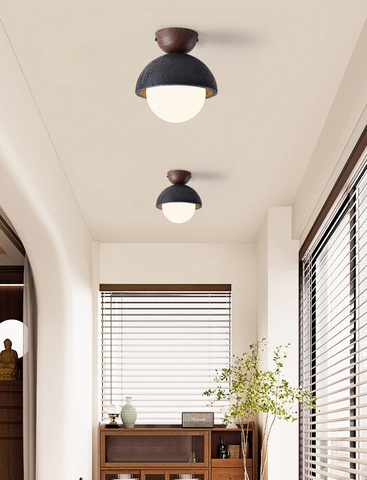 Volcanic Orb Flush Mount Ceiling Light in Black Travertine and Opal Glass