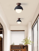Volcanic Orb Flush Mount Ceiling Light in Black Travertine and Opal Glass