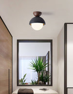 Volcanic Orb Flush Mount Ceiling Light in Black Travertine and Opal Glass