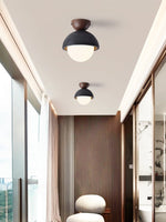 Volcanic Orb Flush Mount Ceiling Light in Black Travertine and Opal Glass