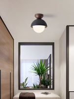Volcanic Orb Flush Mount Ceiling Light in Black Travertine and Opal Glass
