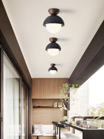 Volcanic Orb Flush Mount Ceiling Light in Black Travertine and Opal Glass