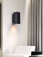 Volkris Black Travertine Wall Sconce — Modern Stone Architectural Lighting