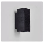 Volkris Black Travertine Wall Sconce — Modern Stone Architectural Lighting