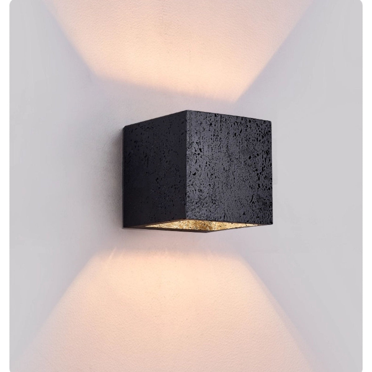 Vulcanis Cube Wall Sconce in Black Travertine with Golden Interior