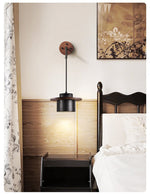 Vulna Wall Sconce in Black Travertine with Walnut Accent