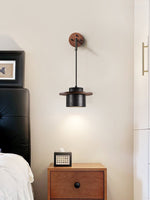 Vulna Wall Sconce in Black Travertine with Walnut Accent