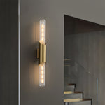 Gold Crystal Chandelier with Brass Wall Sconces and Recessed LED Lights