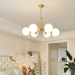 Yisu Brass Chandelier – Vintage Glass Globe Pendant Light for Modern Interiors