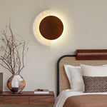 Crescent Halo Plug-In Wall Sconce in Natural Travertine and Wood