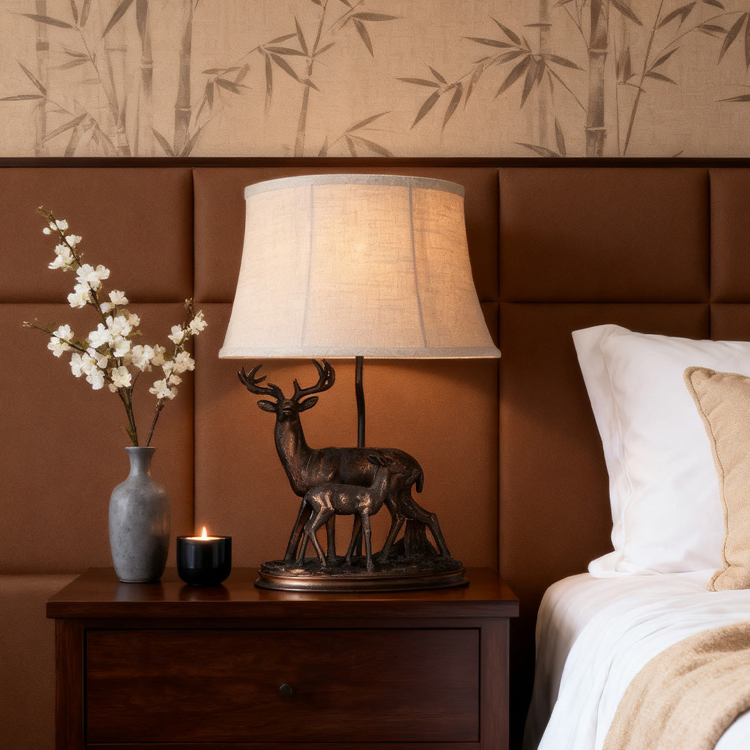 Sculpted Deer Table Lamp with Bronze Finish and Beige Linen Shade