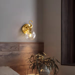 Modern Brass Wall Sconce with Clear Glass Shade for Living Room