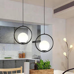 Aurelia Glass Globe Pendant Light in Matte Black Metal Ring