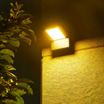 Aria Solar Wall Sconce — Modern Outdoor Lighting in Black Aluminum