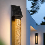 Aria Solar Wall Sconce in Matte Black Stainless Steel