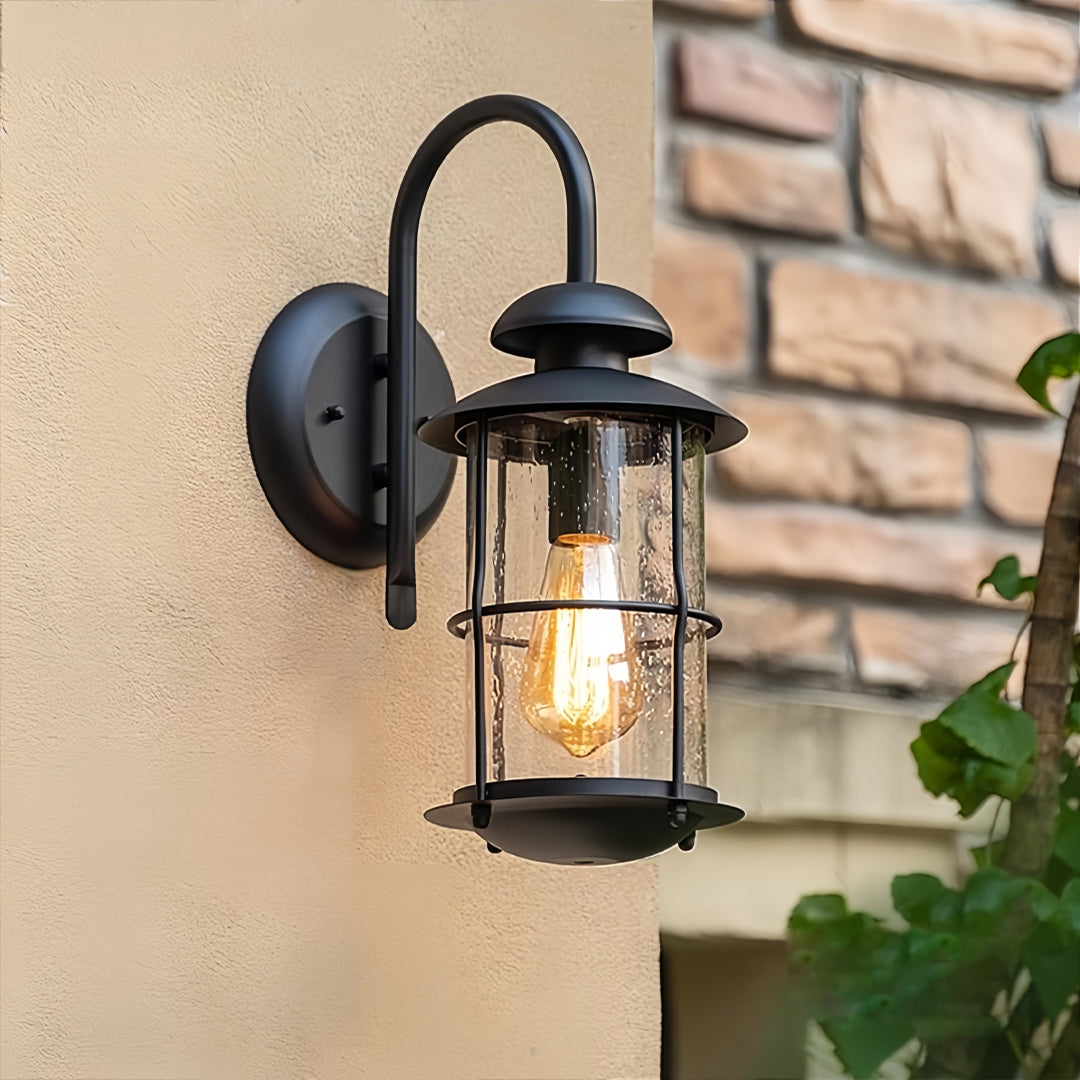 European Outdoor Wall Sconce with Clear Glass Shade in Black Aluminum