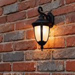 European Outdoor Wall Sconce with Clear Glass Shade in Matte Black Aluminum
