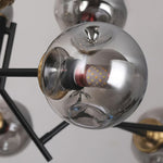 Aurelia Twelve-Light Glass Globe Chandelier in Black Iron