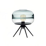 Nordic Glass Table Lamp with Four-Legged Iron Base for Modern Interiors