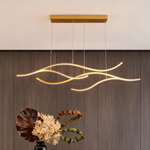 Wavy LED Pendant Light with Adjustable Height in Metallic Finishes