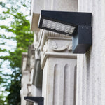 Aria Solar Wall Sconce — Modern Outdoor Lighting in Black Aluminum