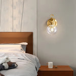 Modern Brass Wall Sconce with Clear Glass Shade for Living Room