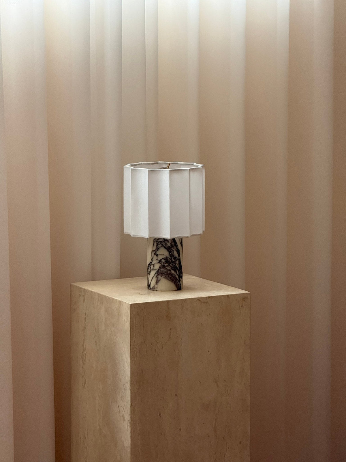 Orbis Veil Table Lamp – Sculptural Marble LED Lamp with Pleated Fabric Shade