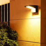 Aria Solar Wall Sconce — Modern Outdoor Lighting in Black Aluminum