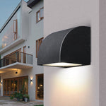 Geometric Outdoor Wall Sconce with Directional LED Light